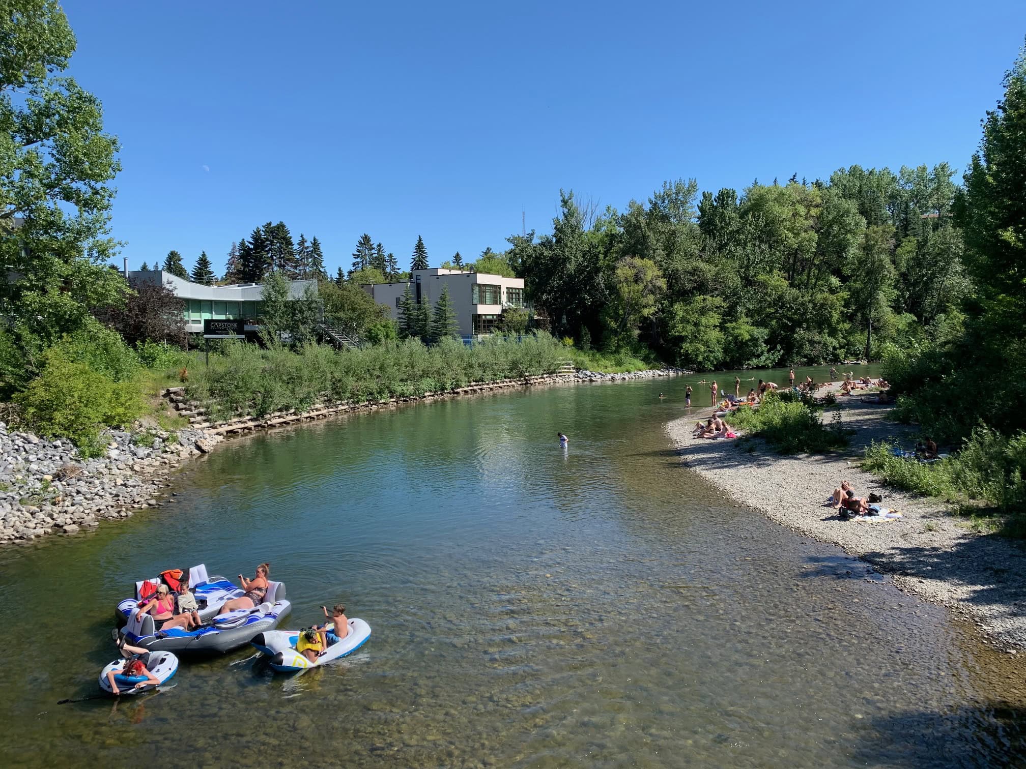 Mission, Calgary, featuring riverfront properties and trendy restaurants.