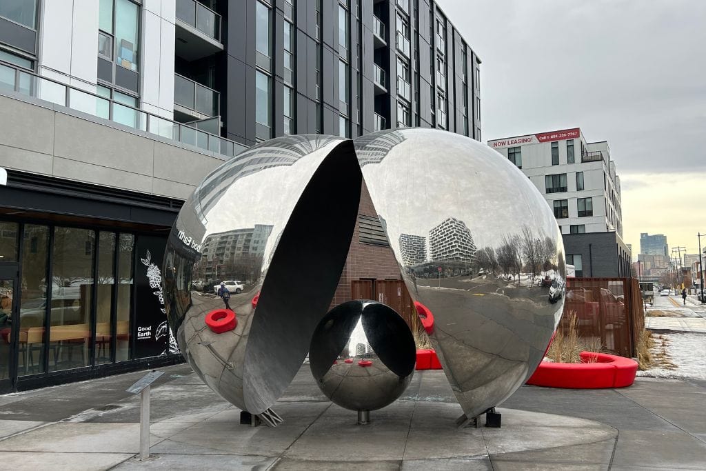 Bridgeland’s trendy streetscape, filled with boutique shops, cafes, and high-rise apartments.