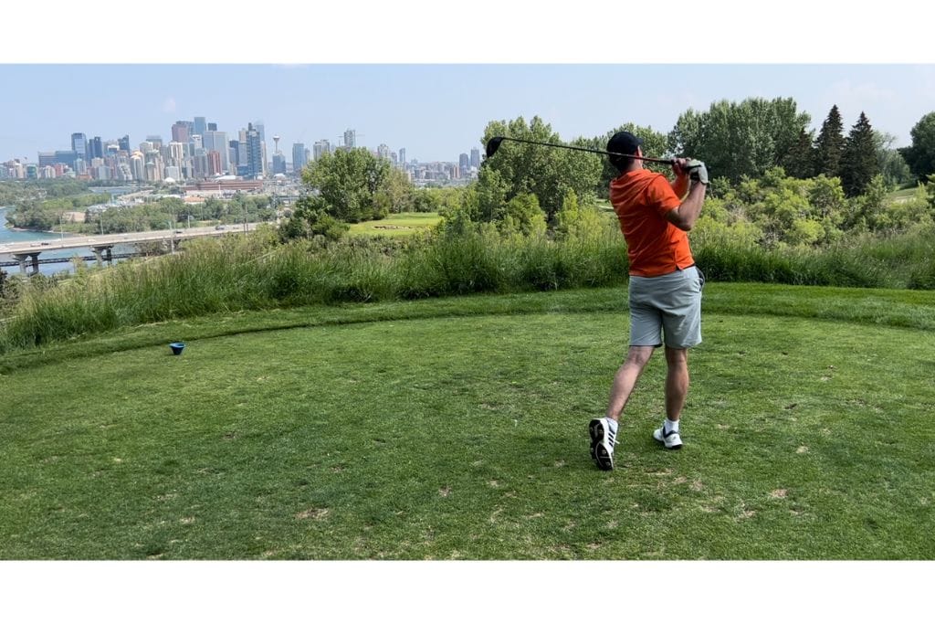 An image of a golfer at Shaganappi Golf Course in Calgary.