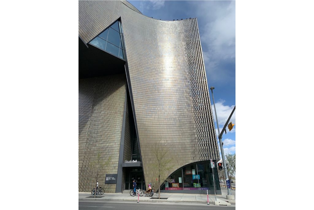 East Village in downtown Calgary, showcasing modern condos, studio bell, and urban parks.