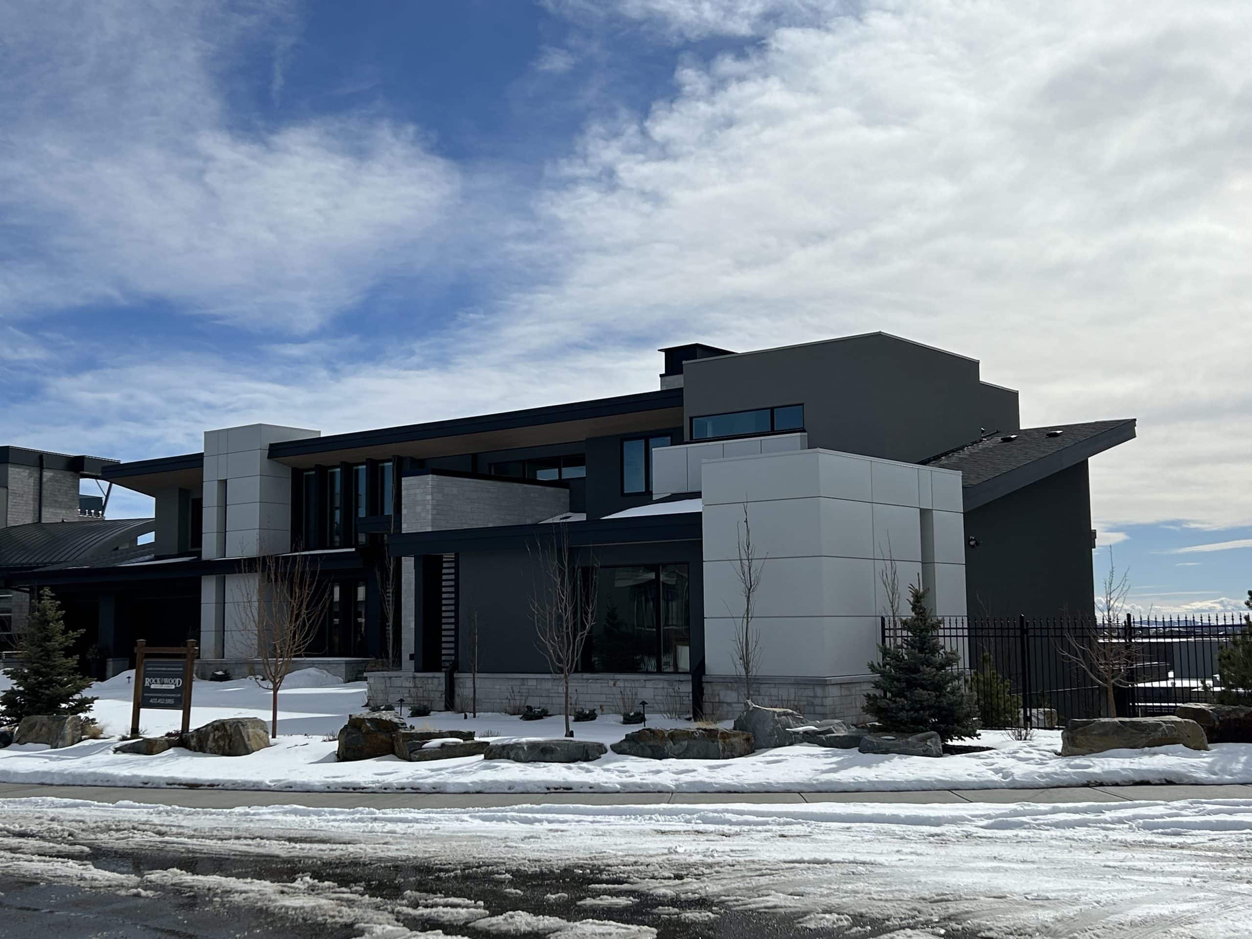 Contemporary luxury home in Aspen Woods with striking architecture and family-friendly amenities in an upscale neighborhood.