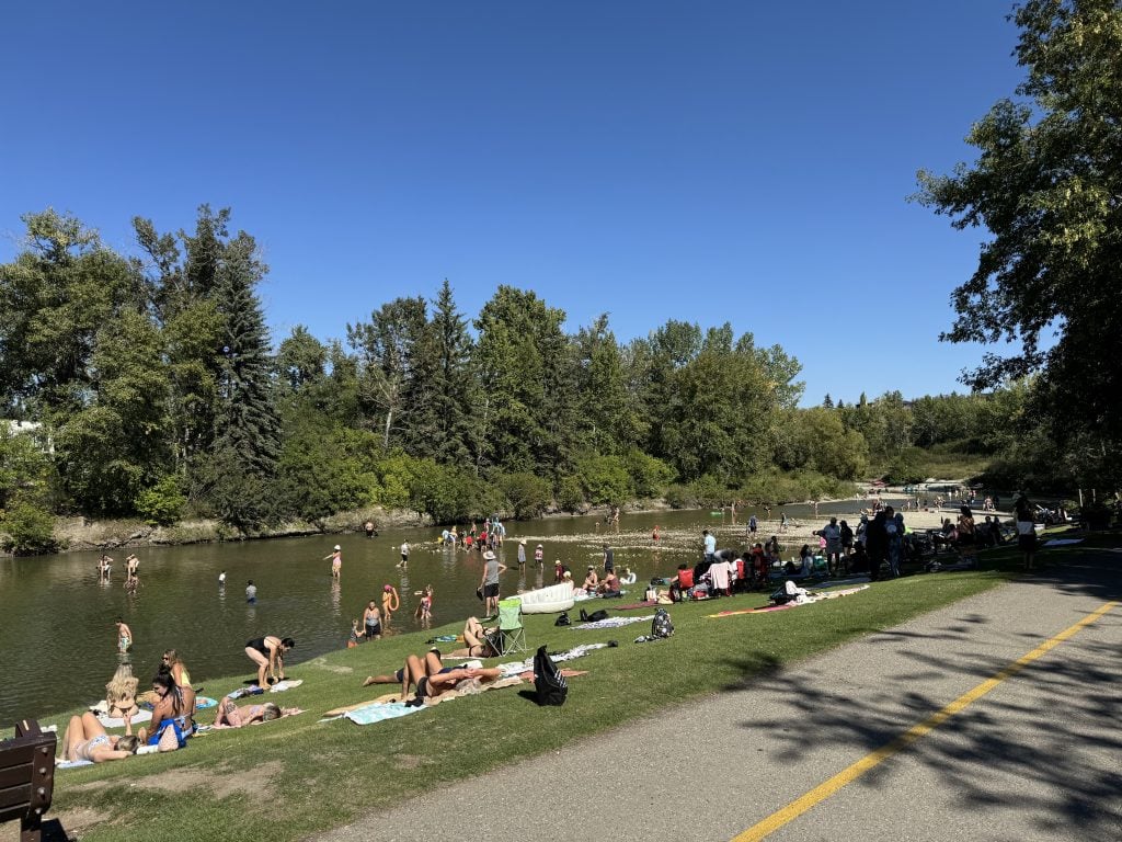 Street view of elegant homes in Elbow Park, exemplifying Calgary’s luxury real estate near river pathways and top-rated schools.