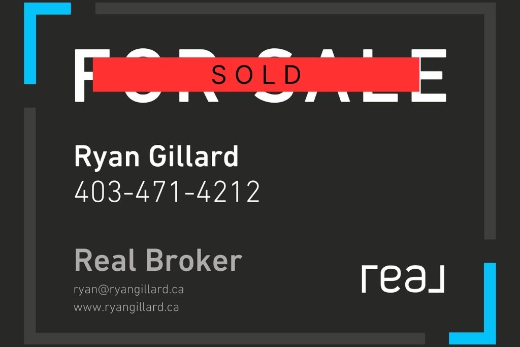 Real estate sign placed by Ryan Gillard in front of a Calgary home—professional marketing makes a difference.