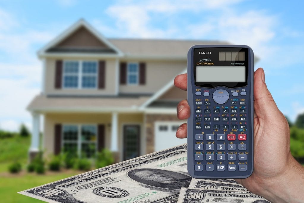 Home sale net sheet with calculator used to estimate closing costs in Calgary.