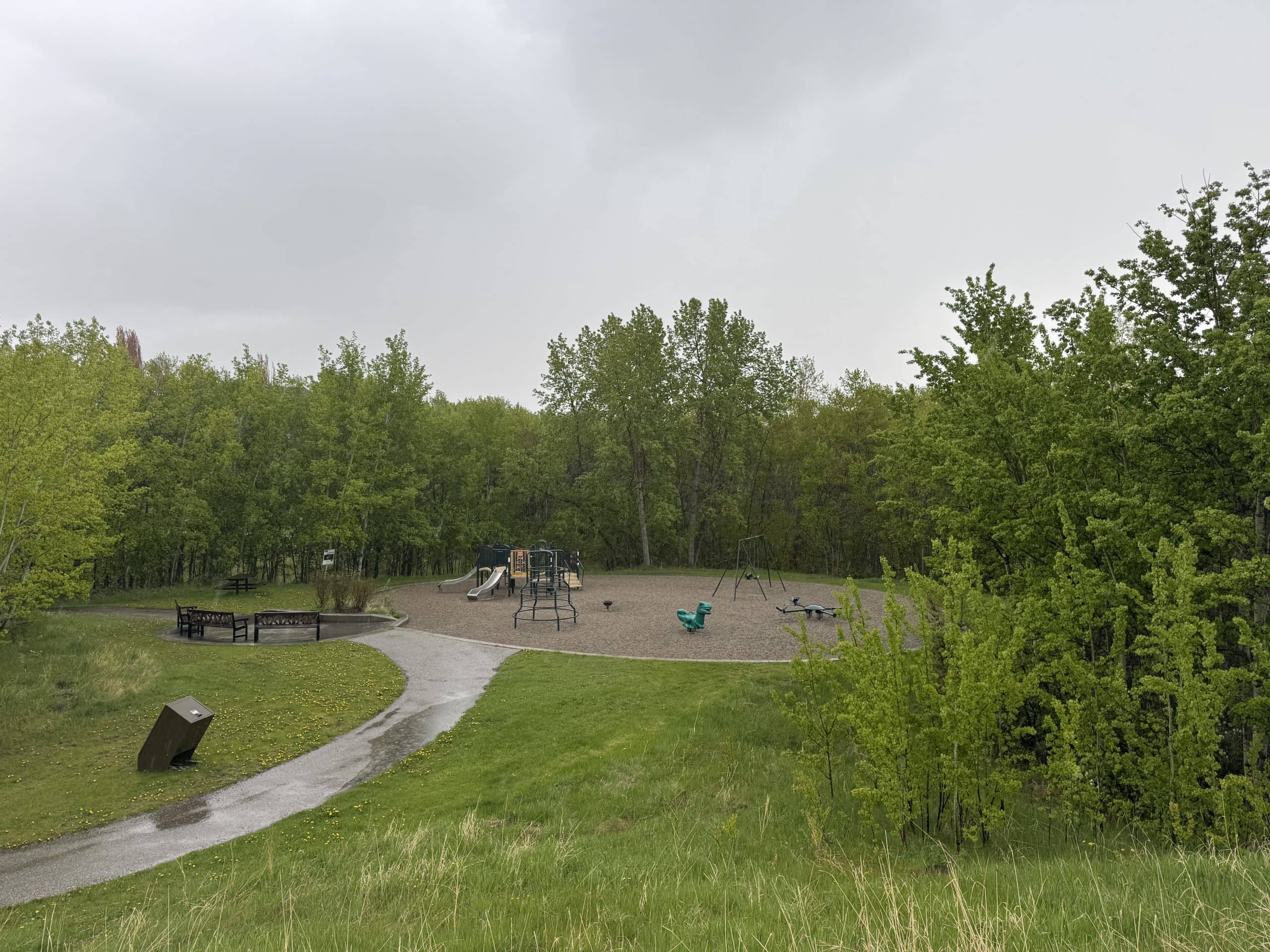 A family-friendly park in West Springs featuring open green space and playground amenities.