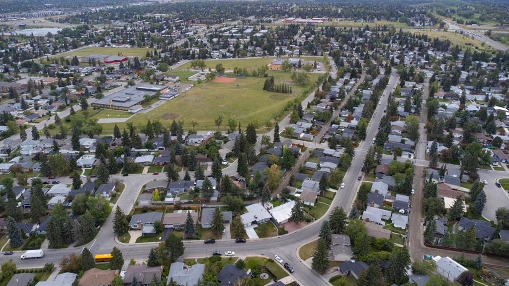 Aerial view of Southwood, Calgary showing residential homes with a school field in the center of the image.