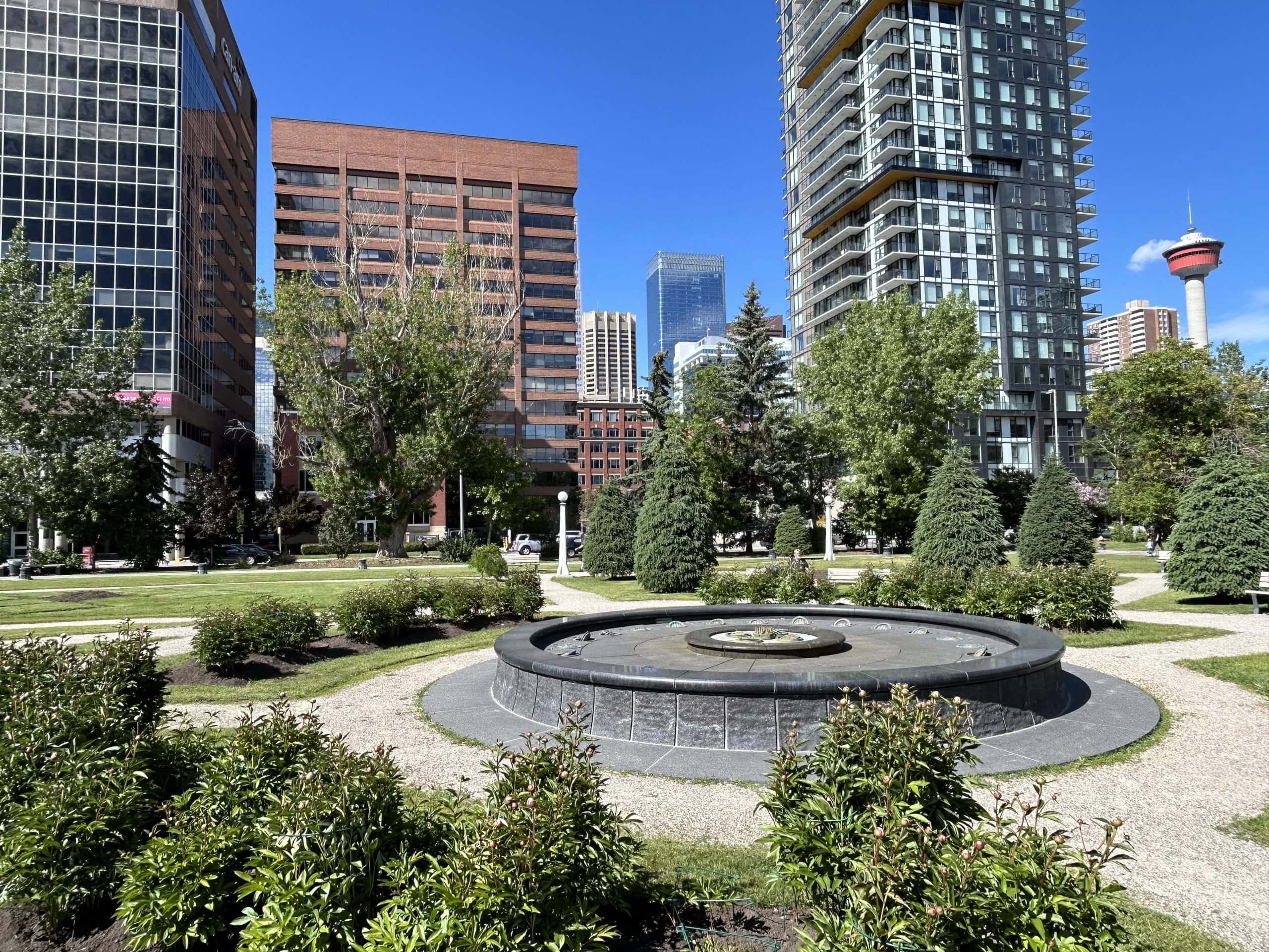 Urban park and condos in Calgary’s Beltline near downtown — a desirable area where well-located units are still attracting condo buyers in 2025.