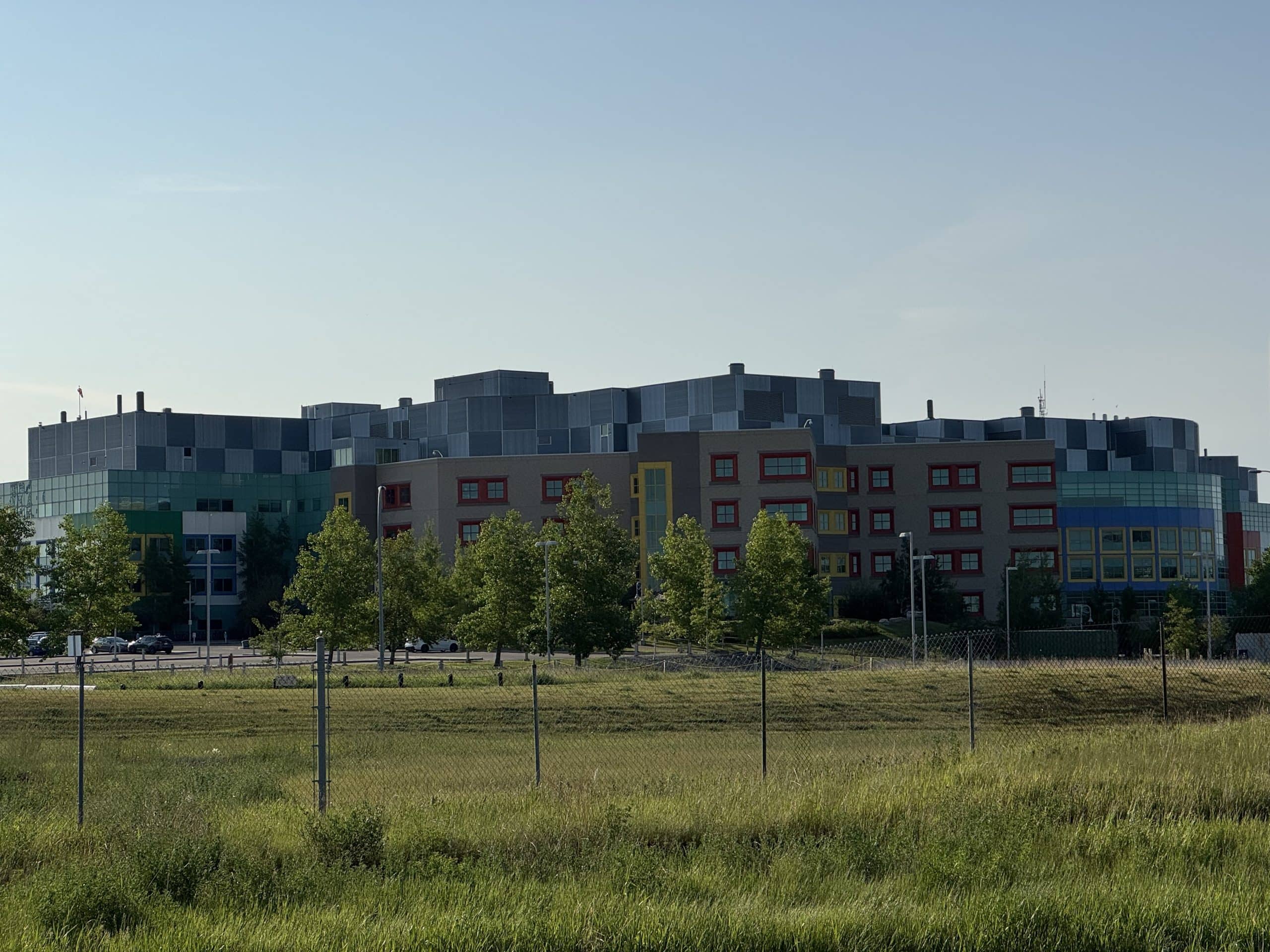 Alberta Children’s Hospital near Montgomery Calgary, surrounded by green space and trees in summer