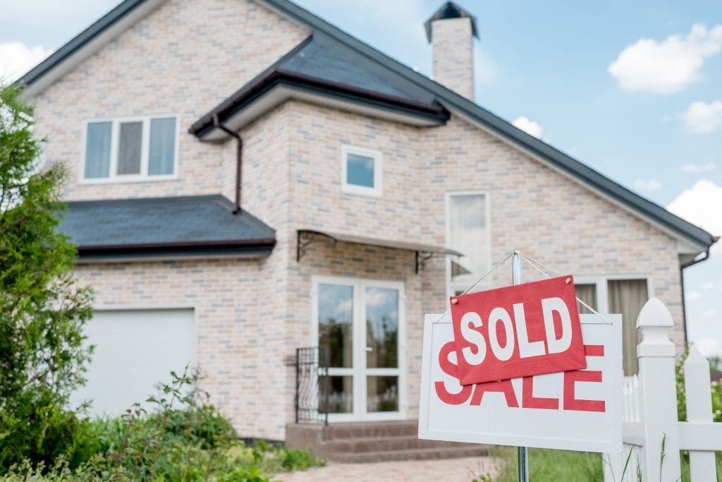 Modern Calgary home for sale with excellent curb appeal, showcasing a well-maintained exterior—ideal for local home sellers looking to maximize property value