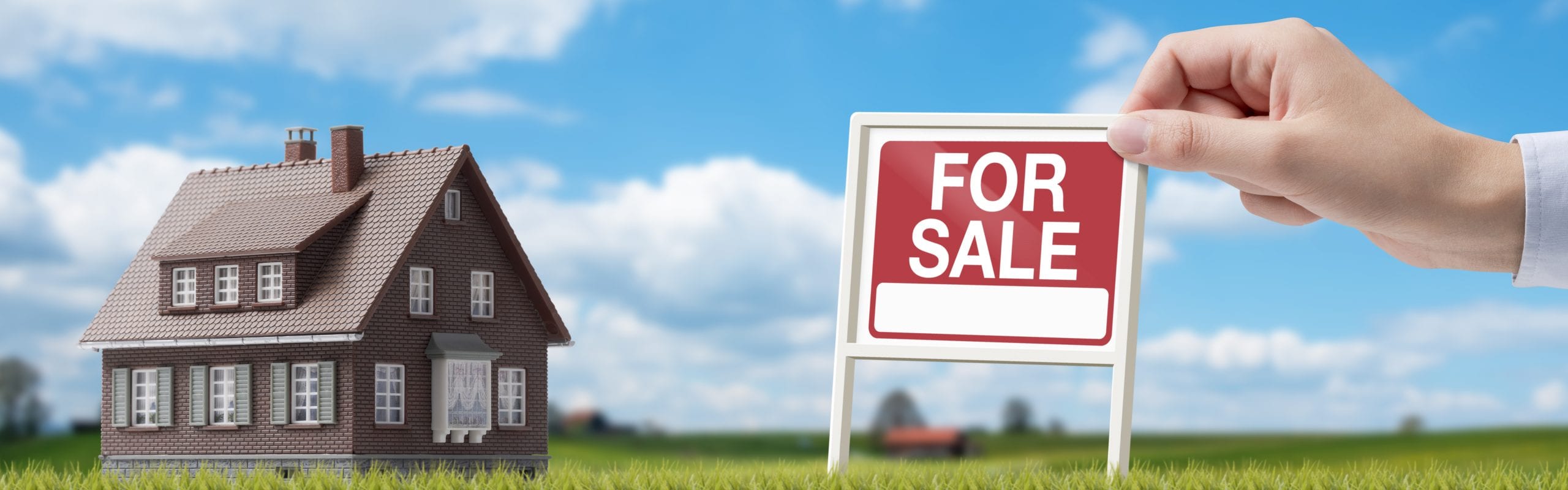 Illustration of a model house and a hand placing a red "For Sale" sign on a grassy lawn under a blue sky, representing a home that is currently listed but not selling