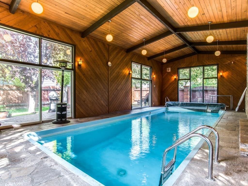 Indoor pool in Calgary home with high maintenance features that can reduce buyer interest