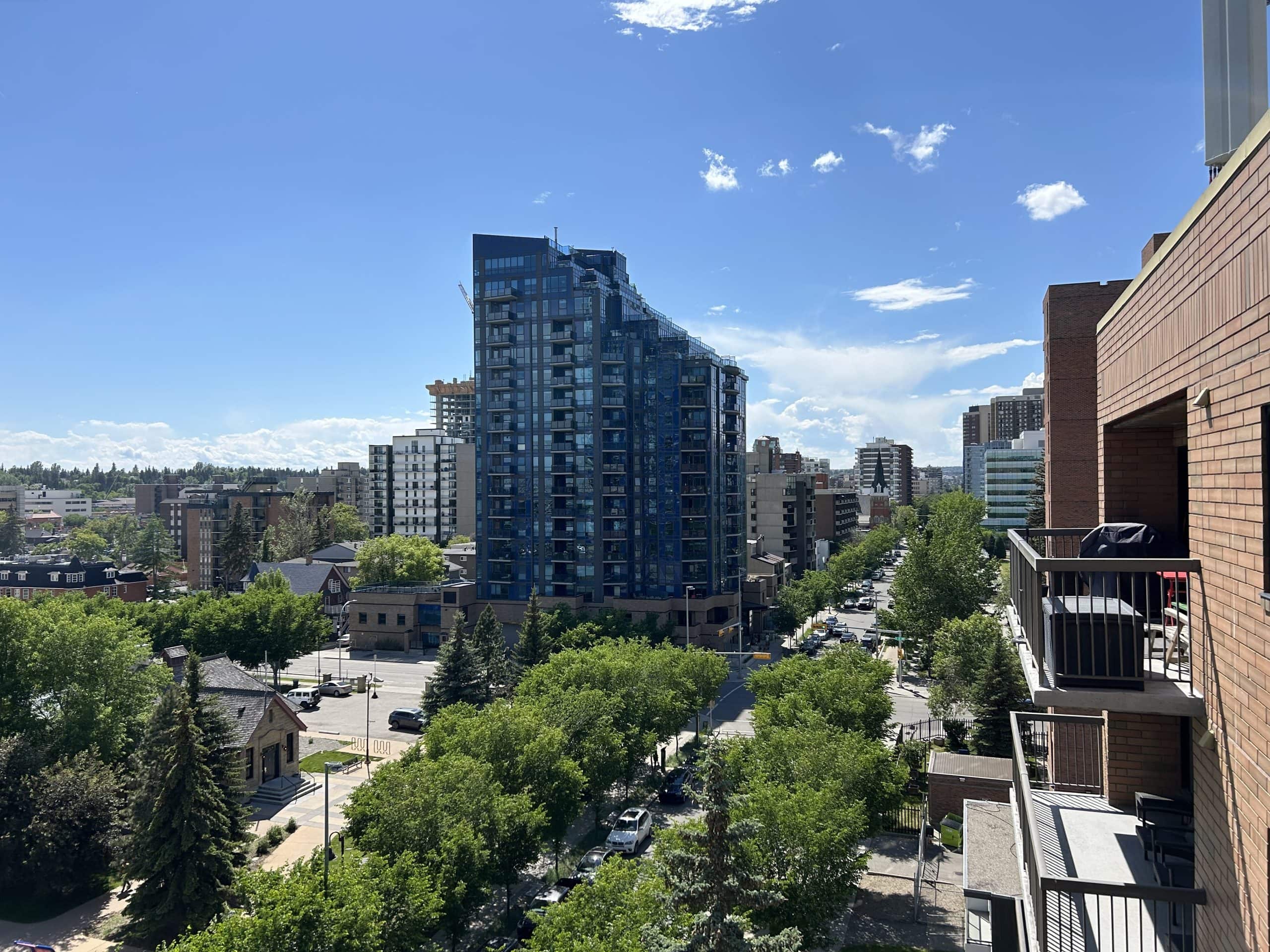 View of Calgary condo towers and urban residential buildings near downtown, highlighting condo living and changing market conditions in Calgary.