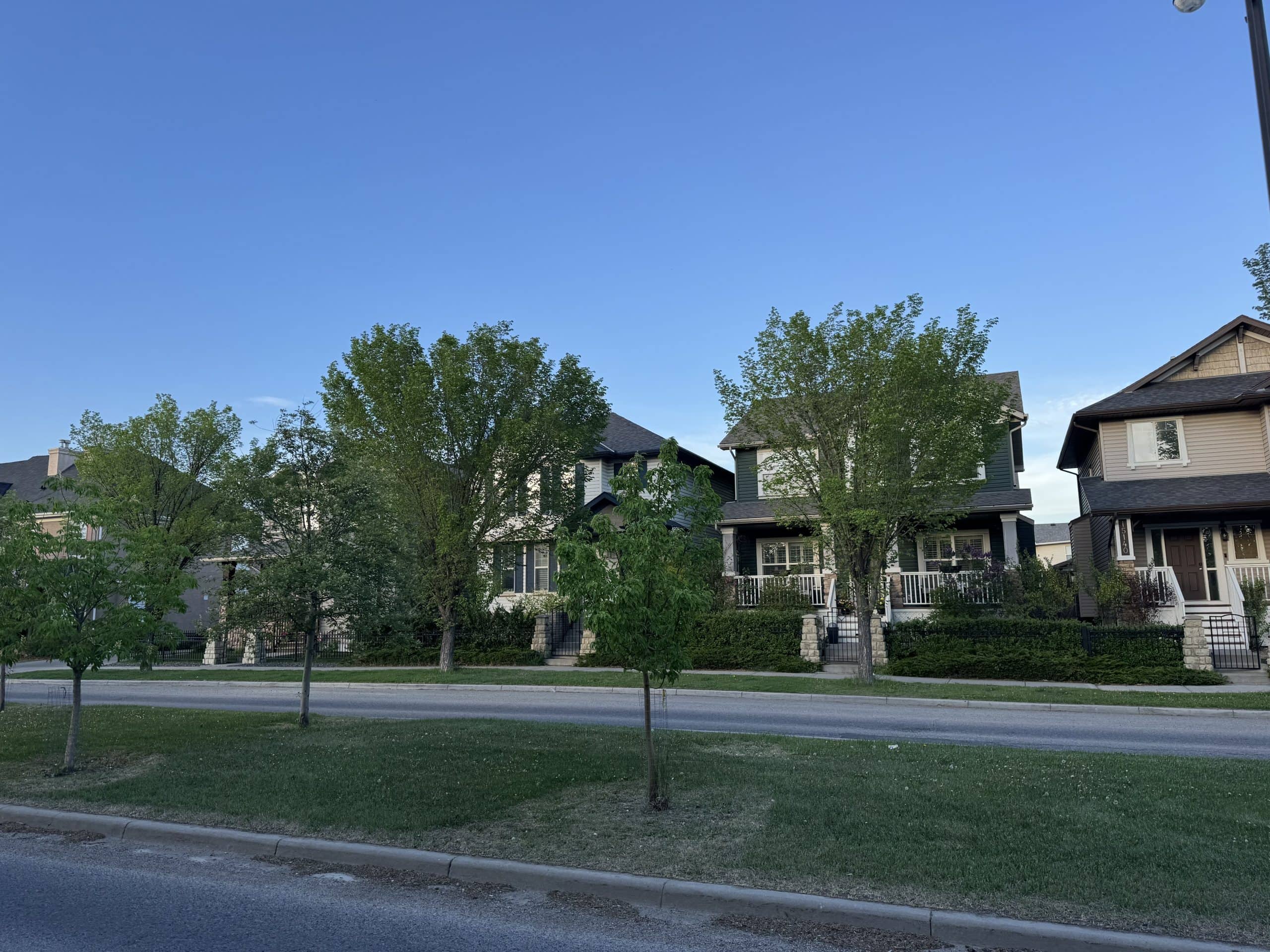 Detached homes in Prestwick, McKenzie Towne featuring mature trees, front porches, landscaped streets, and a family friendly atmosphere close to parks, schools, and shopping in southeast Calgary.