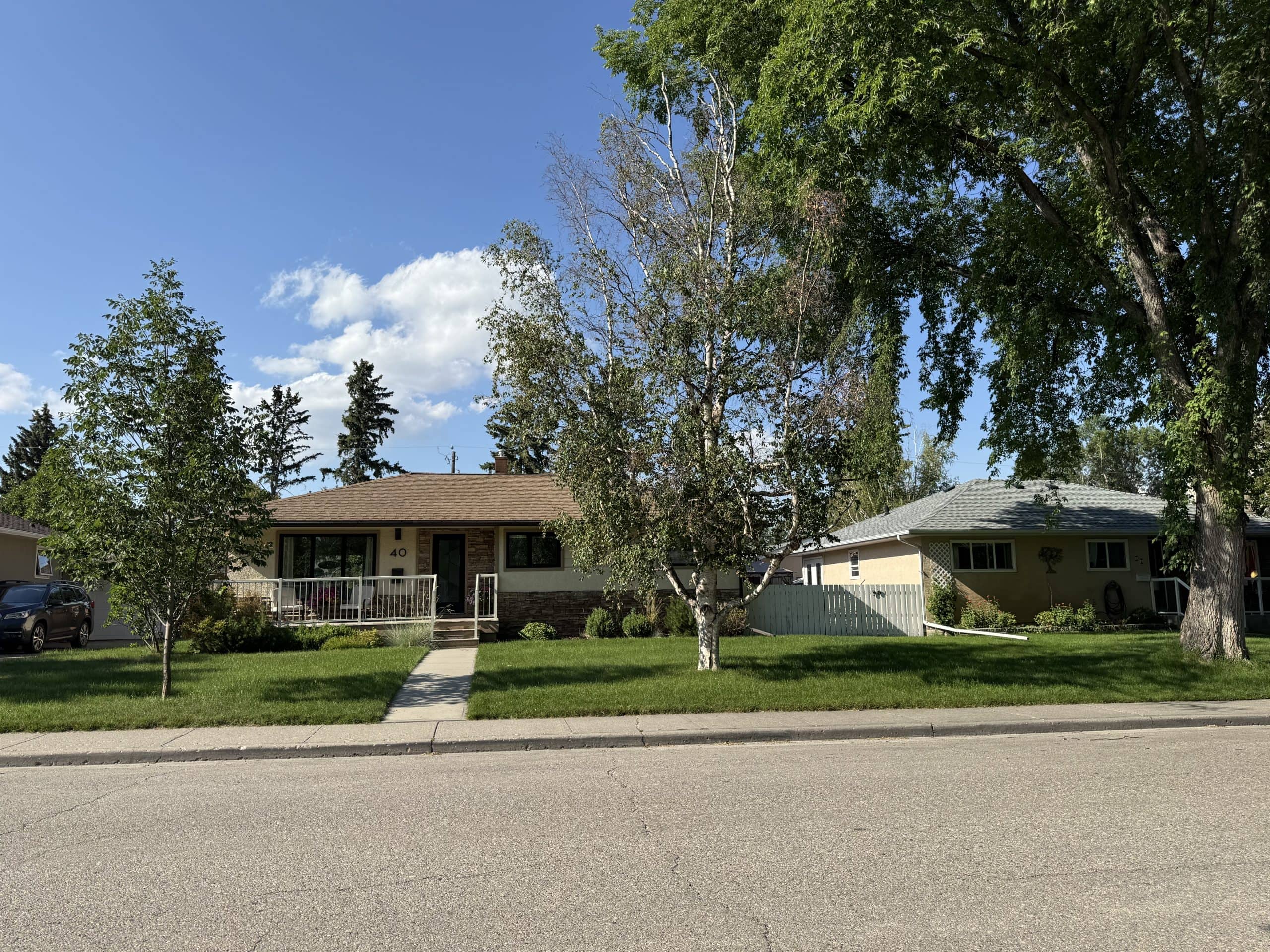 Established detached homes on spacious lots in Glamorgan, Calgary, showcasing the neighbourhood's mature trees, classic mid century character, and affordable west Calgary lifestyle.