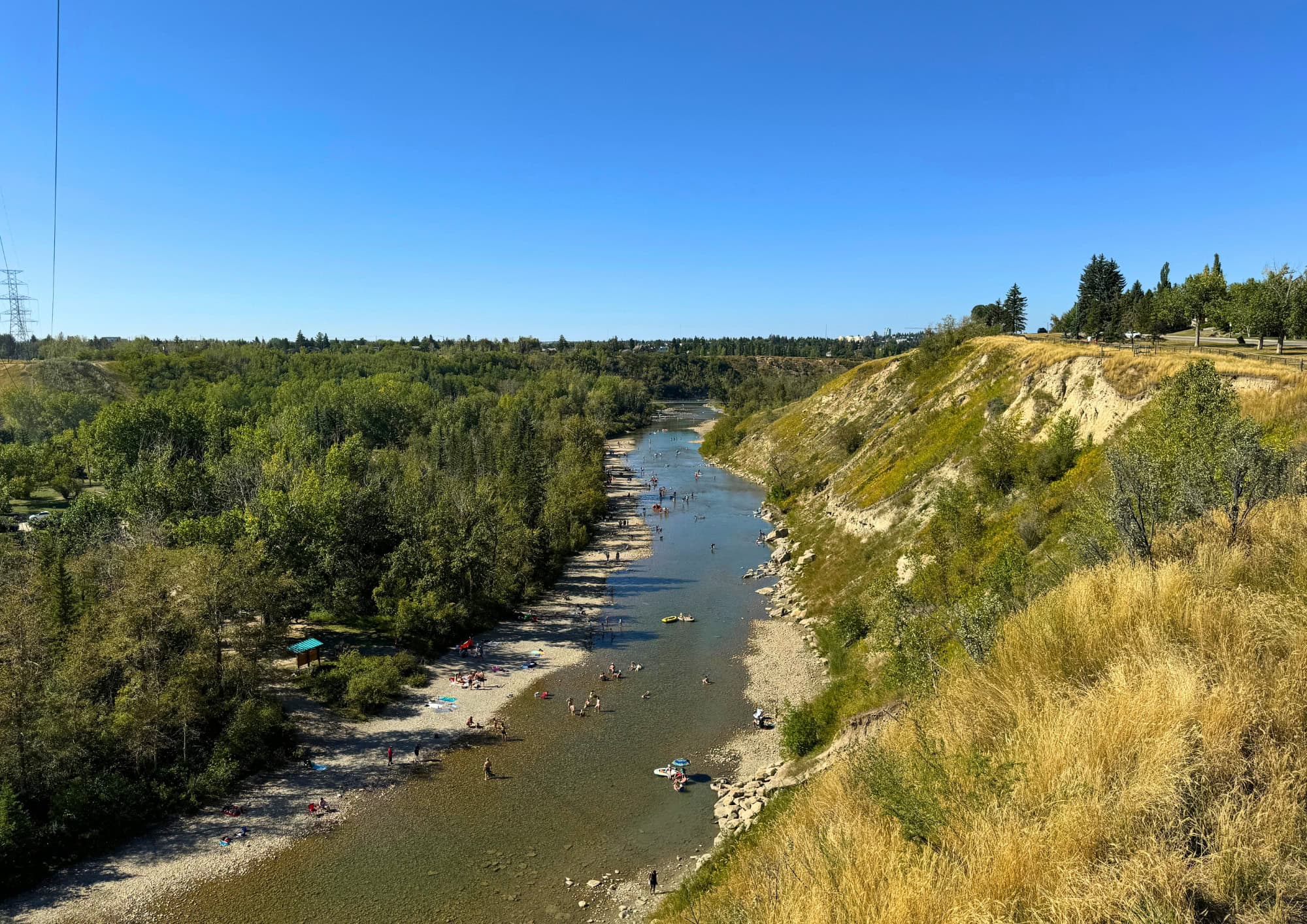View of the Elbow River valley from Britannia in Calgary, showcasing the community's elevated location, river views, and surrounding green space.