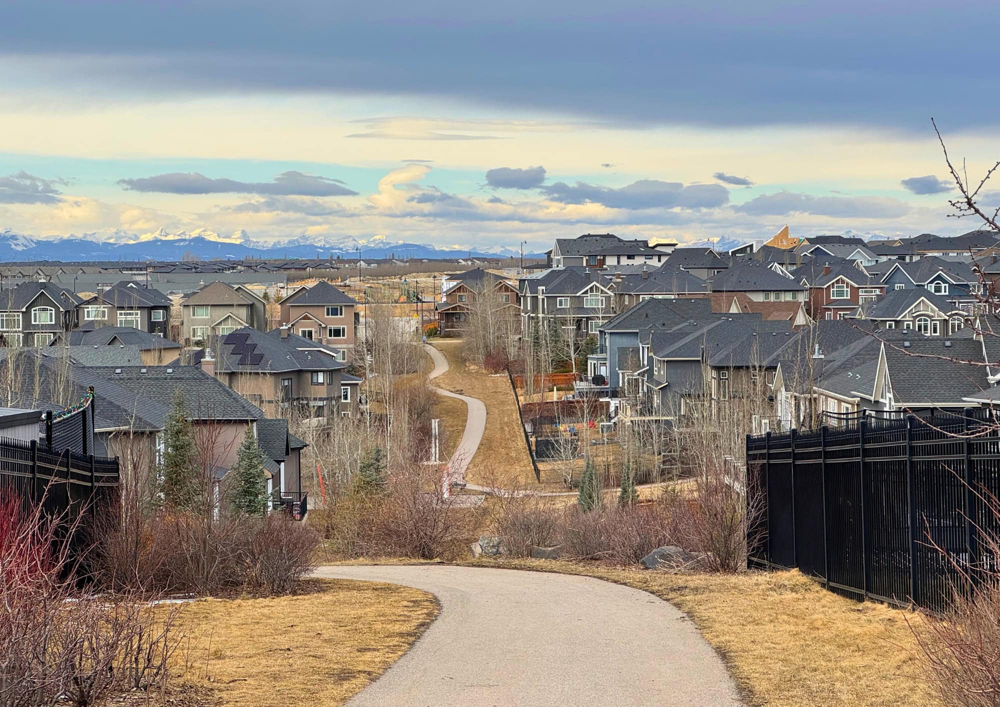 Discover Aspen Woods, one of Calgary's premier west side communities, known for luxury homes, mountain views, excellent schools, scenic pathways, and convenient access to downtown.