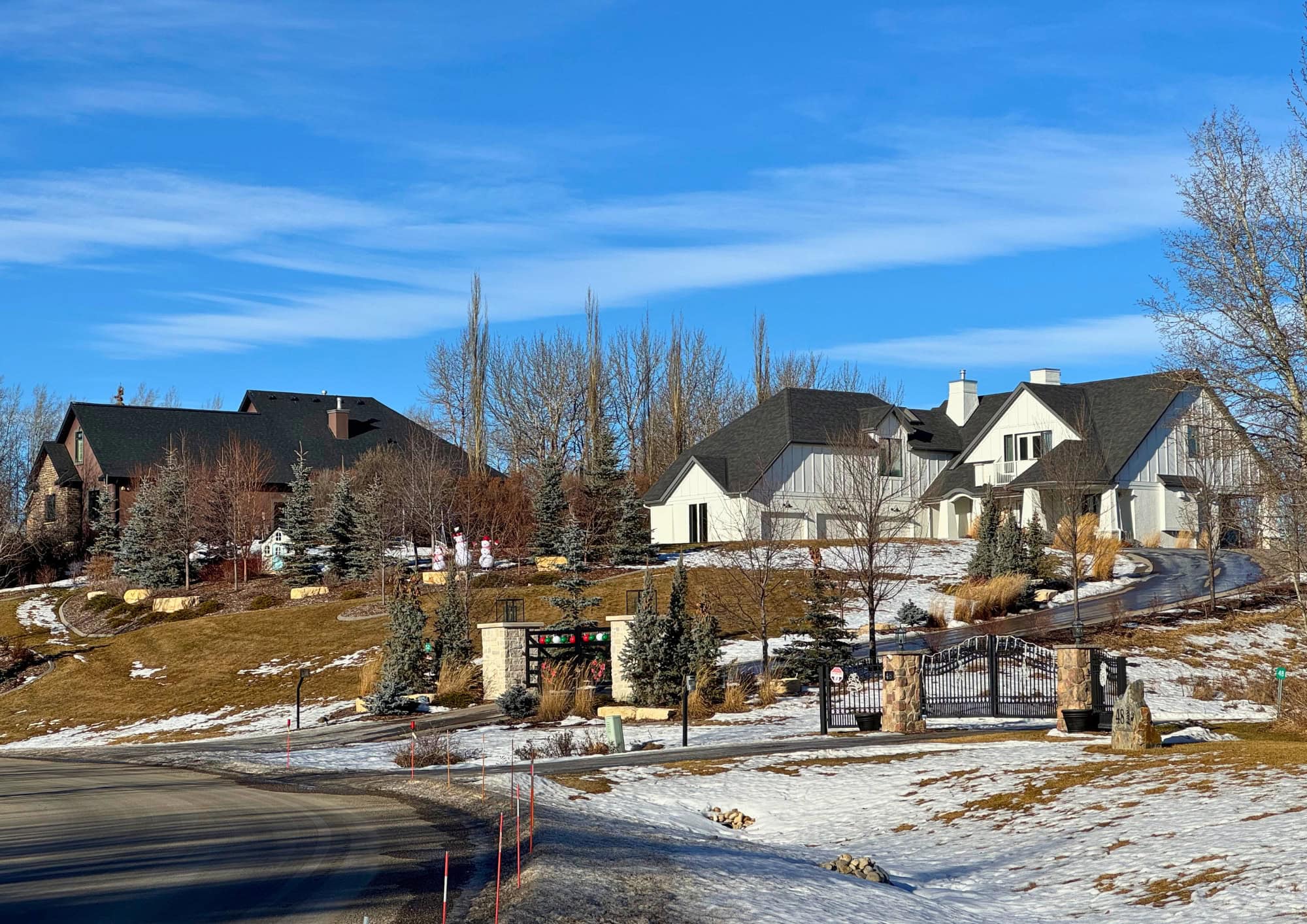 Luxury estate homes in Bearspaw, an exclusive rural community just northwest of Calgary known for sprawling acreages, custom-built homes, privacy, and scenic countryside living.