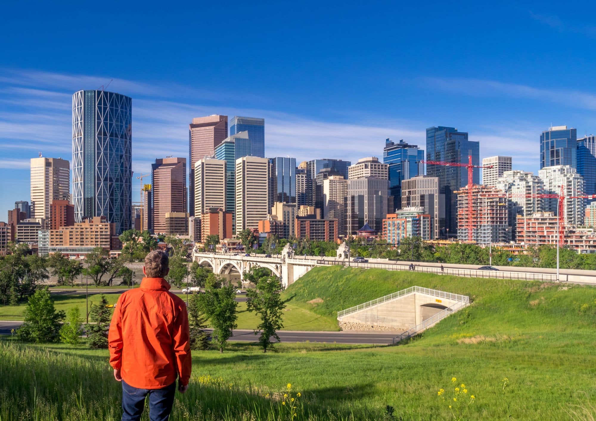 View of the downtown Calgary skyline from Scotsman’s Hill on a sunny summer day.