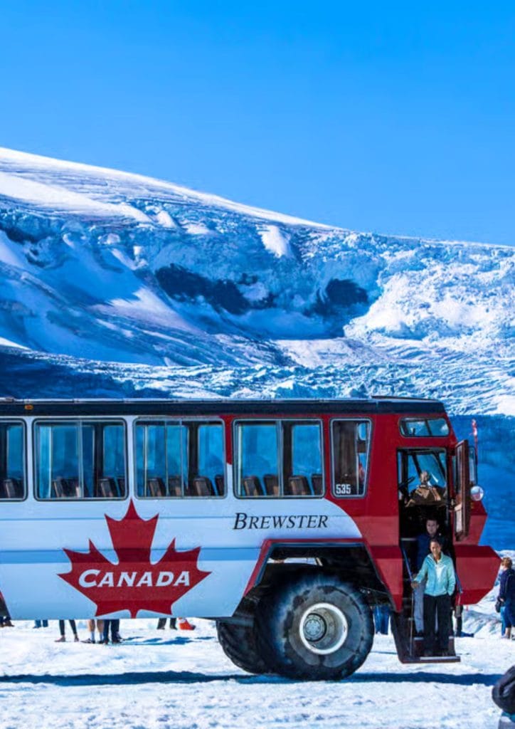 Columbia Icefield Ice Explorer on the Athabasca Glacier along the Icefields Parkway in Jasper National Park, Alberta.