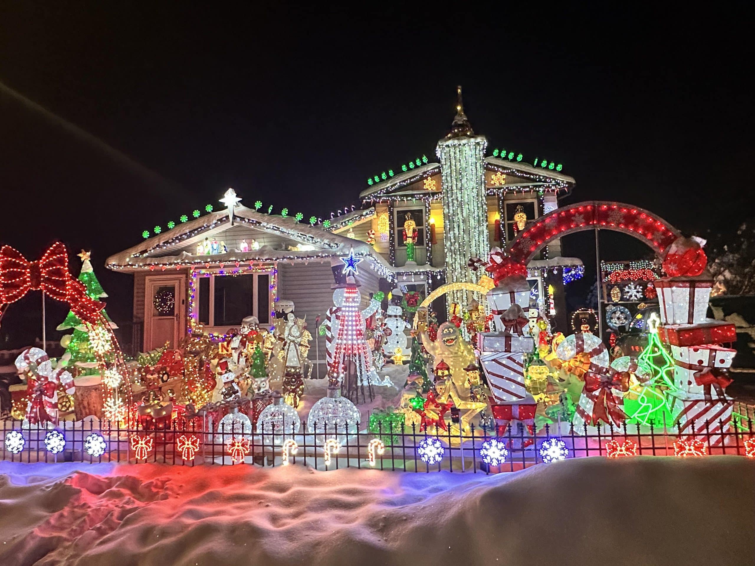 Colourful Christmas light display at a Calgary home during the winter holiday season.