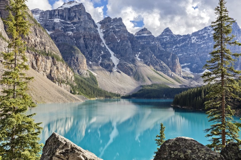 Moraine Lake in Banff National Park, Alberta, with turquoise water surrounded by the dramatic peaks of the Valley of the Ten Peaks.